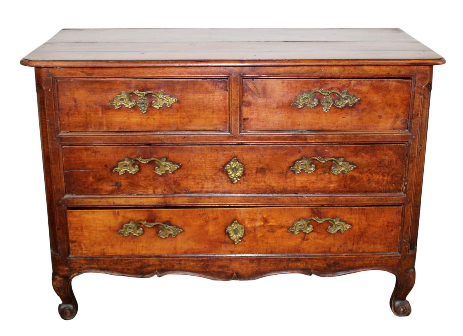 French 2 over 2 commode in walnut: French 2 over 2 drawer commode in walnut. Early 19th century. 33 1/2"h x 48"w x 22 1/2"d