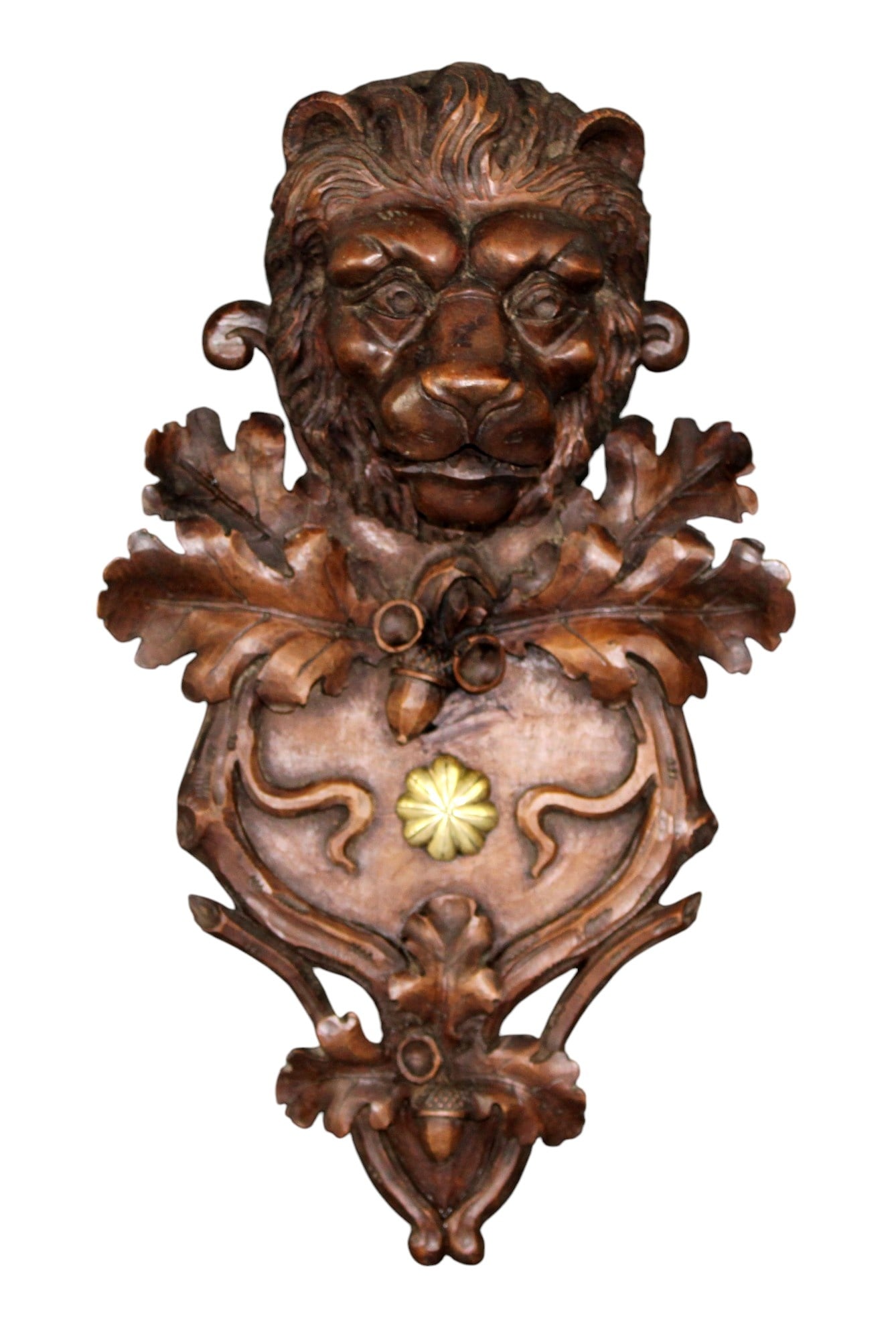 French carved walnut lion plaque: French carved walnut lion plaque with acorns. Late 19th century. 14 3/4"h x 8 1/2"w. Weight: 2lbs.