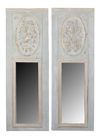 Pair of French trumeau mirrors with relief carvings
