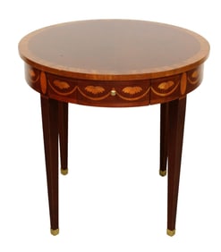 Baker mahogany round side table on tapered legs