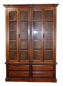 4 door bookcase in oak with paned glass upper doors and iron elongated locks