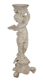 Carved and painted wooden pedestal with figural cherub