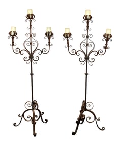 Pair of iron floor candle torchieres