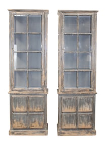 Pair of distressed painted cabinets with beveled paned glass