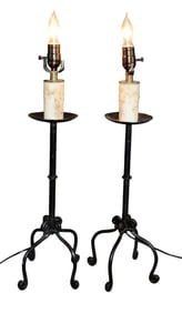Pair of iron table lamps with wax candle sleeves