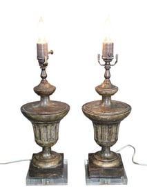 Pair of classical carved wood urn form table lamps on lucite bases