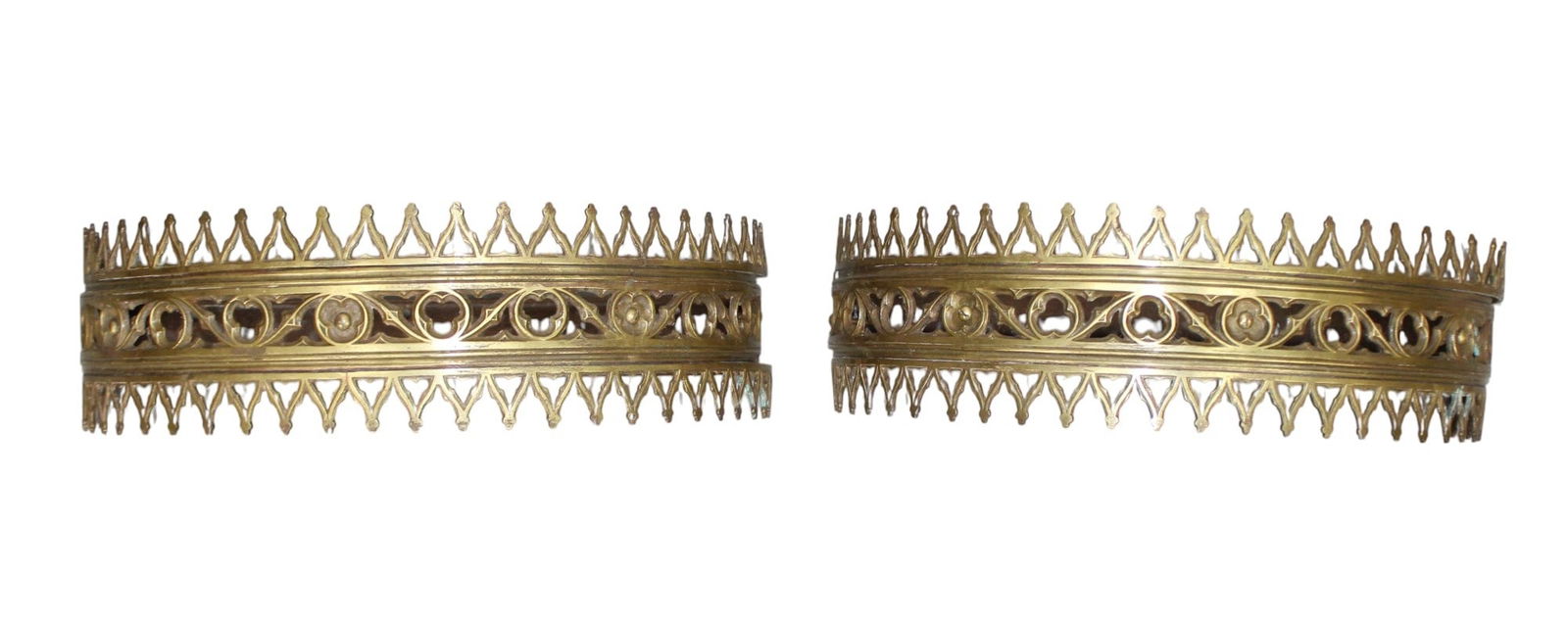 Pair of French Gothic Revival demi lune bed canopies in bronze: Pair of French Gothic Revival demi lune wall mount bed canopies in bronze. Early 20th century. Each approximately: 6"h x 20 1/2"w x 9 3/4"d.