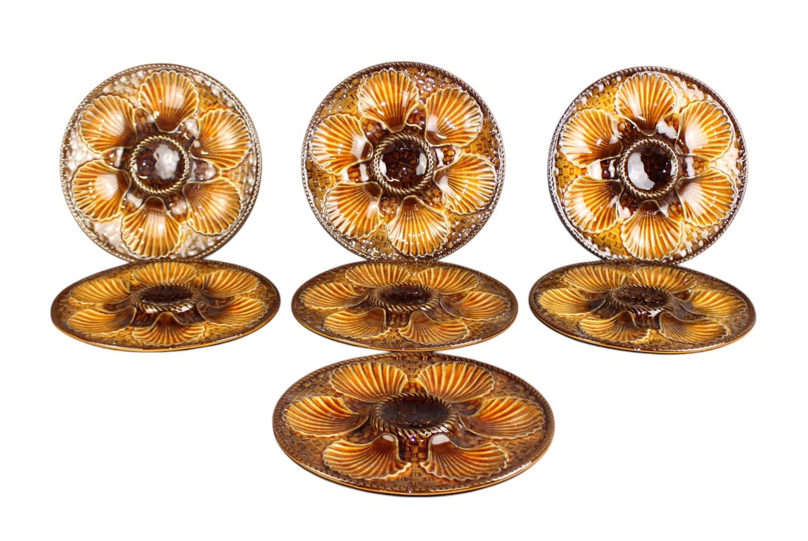 Lot of 7 French Longchamp majolica oyster plates: Lot of 7 French Longchamp majolica oyster plates. 9 1/2" dia Weight: 10lbs