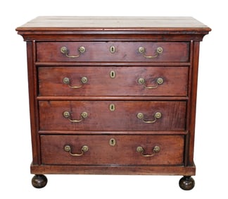 English 4 drawer chest in walnut on ball feet