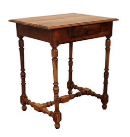 French side table in walnut on turned legs with single drawer