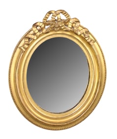 French Louis XVI style small oval gilt wood mirror