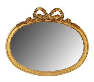 French Louis XVI style oval giltwood mirror with ribbon and bow