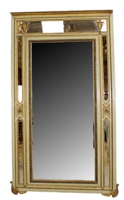 French Empire trumeau mirror in parcel gilt with urns