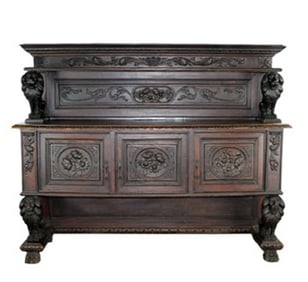 Italian Renaissance relief carved walnut sideboard with full figure lion supports
