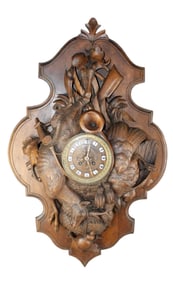 Black Forest carved walnut trophy plaque with clock