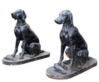 Companion pair of cast iron seated entry dogs