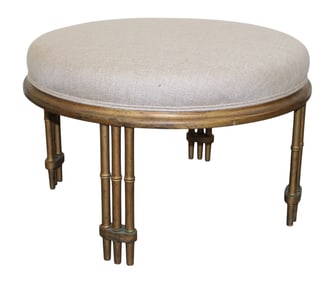 Upholstered round ottoman on faux bamboo legs