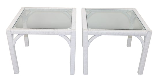Pair of rattan side tables with glass tops