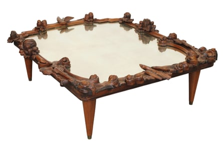 Relief carved mirror with focal bird coffee table