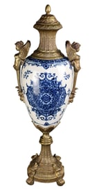 Bronze blue & white crackle finished ceramic lidded urn with winged maidens