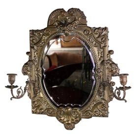 Dutch repousse brass mirror with lion mask and attached candle sconces