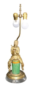 Bronze figural lamp man with pipe seated on Majolica column