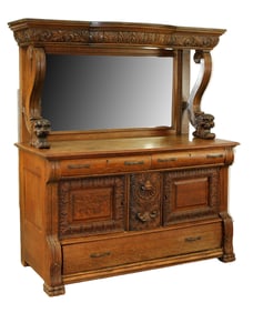 Antique American oak sideboard with mirror on carved paw feet