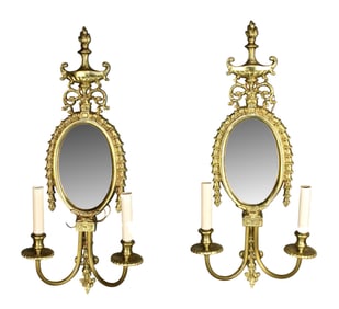 Pair of Neo-Classical mirrored 2 arm sconces in gilt bronze