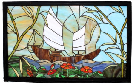 Stained and leaded glass window with ship