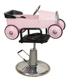 Child's pink car form barber chair