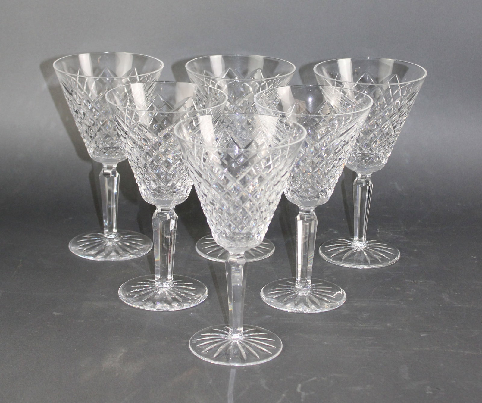 Set of 6 Waterford cut diamond crystal wine glasses: Set of 6 Waterford cut diamond crystal wine glasses. 7"h x 4" dia each. Weight: 4lbs