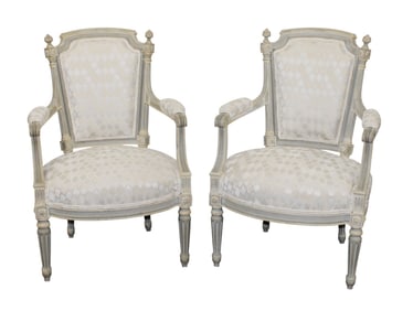 Pair of French Louis XVI style arm chairs on painted frames