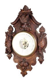 Black Forest barometer in carved oak with hunt motif