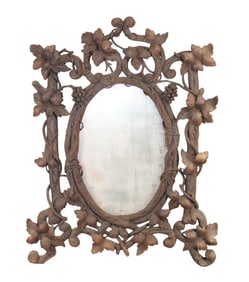Black Forest pierce carved naturalistic mirror with vines