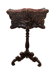 Black Forest carved walnut jardiniere with naturalistic carvings