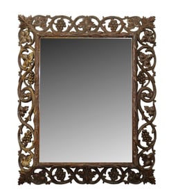 French pierce carved oak mirror with naturalistic grapevines and beveled glass