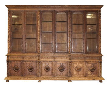 Monumental French chateau 6 door bookcase with relief carved game