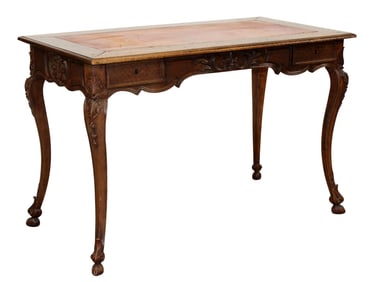 French Regency carved walnut bureau plat desk with leather top