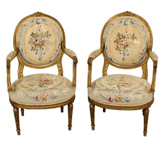 Pair of French Louis XVI balloon back armchairs with needlepoint upholstery