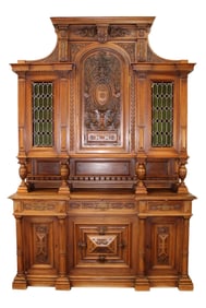 French carved walnut buffet with stained glass doors and carved crest
