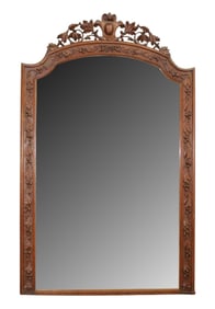 French carved oak mirror with cabochon crest