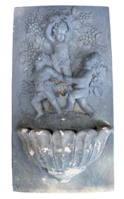 Cast and painted concrete wall fountain with cherubs