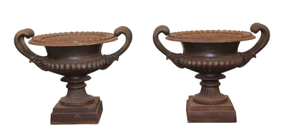 Pair of cast iron garden urns with handles