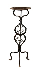 Iron sundial on wrought iron pedestal