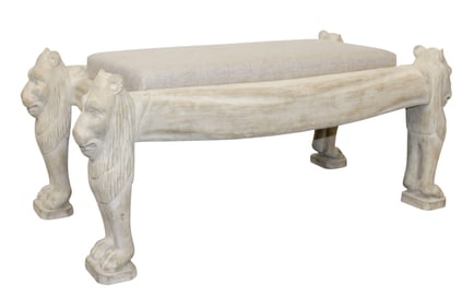 Carved bench with lion supports