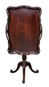 Tilt top foyer table in mahogany with pierce carved gallery