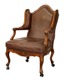 Louis XV style winged club chair on walnut frame