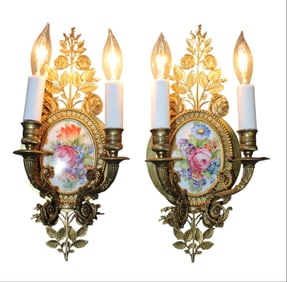 Pair of Louis XVI style bronze and porcelain sconces
