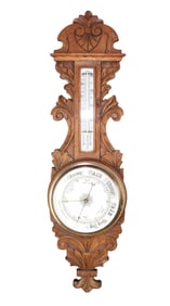 American carved oak barometer and thermometer