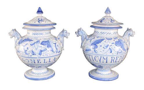 Lot of 2 Italian Majolica apothecary jars with lion heads: Lot of 2 Italian Majolica apothecary jars with lion heads. Overall 11"h x 9 1/4"w (overall), 7 1/4"dia Weight: 8lbs total.